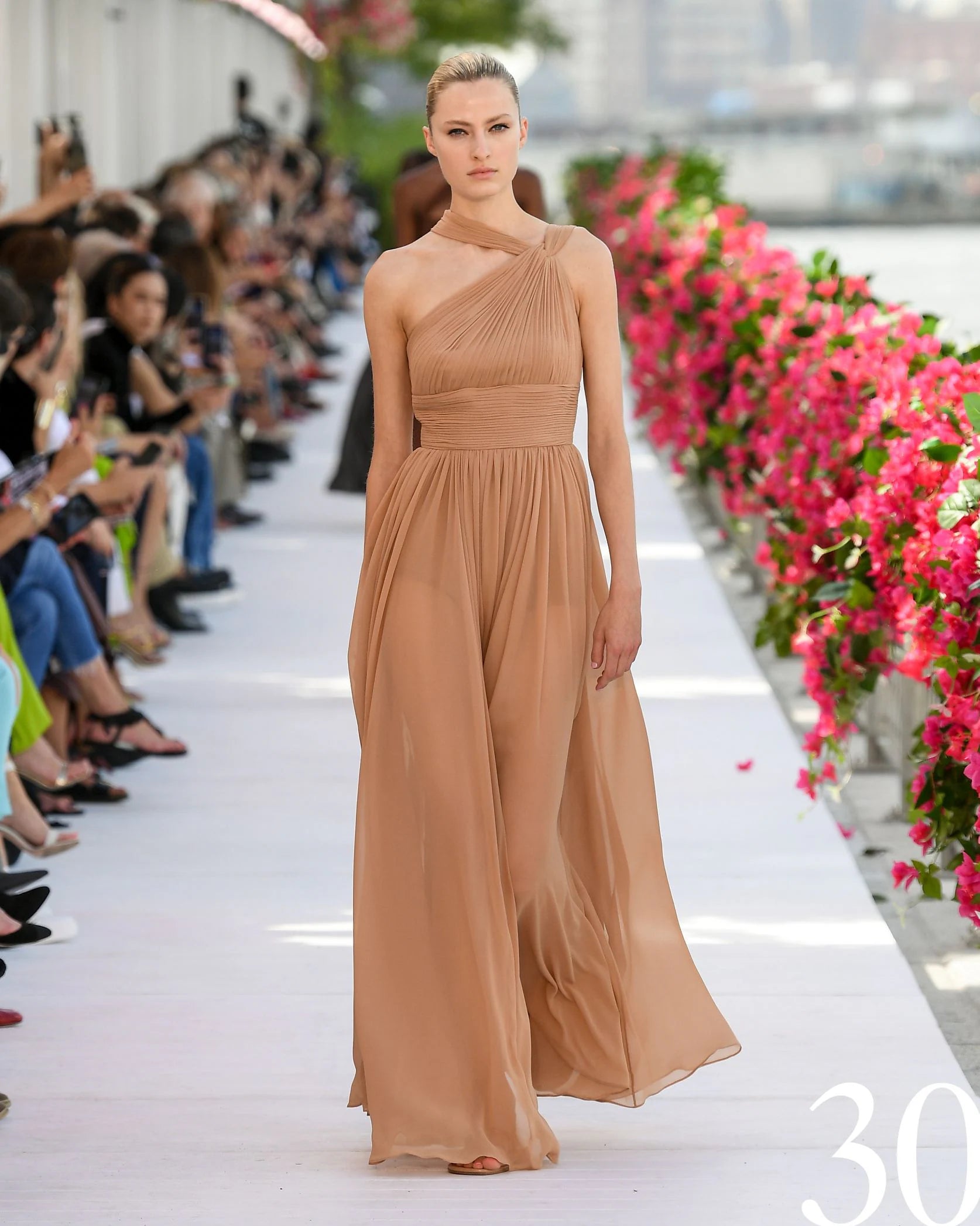 pleated halter gown by Michael Kors on model on runway