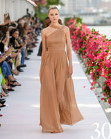 pleated halter gown by Michael Kors on model on runway