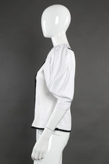 Balloon sleeve peplum top by Yves Saint Laurent on mannequin side @recessla