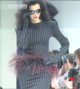 Feathers as boa on model on '89 runway @recess la