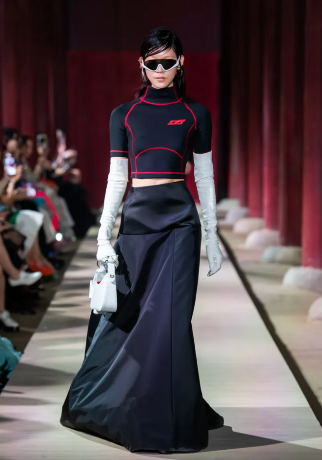 Black ball skirt by Gucci on model on runway 