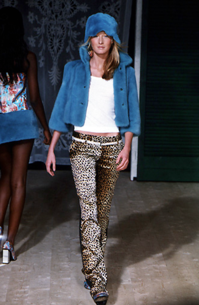 Fur bucket hat by Dolce & Gabbana in blue on model on runway 