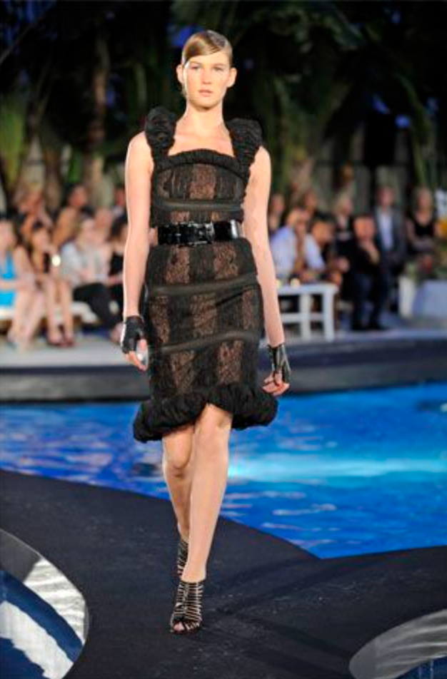 Lace ruffle dress by Chanel on model on 2009 runway 