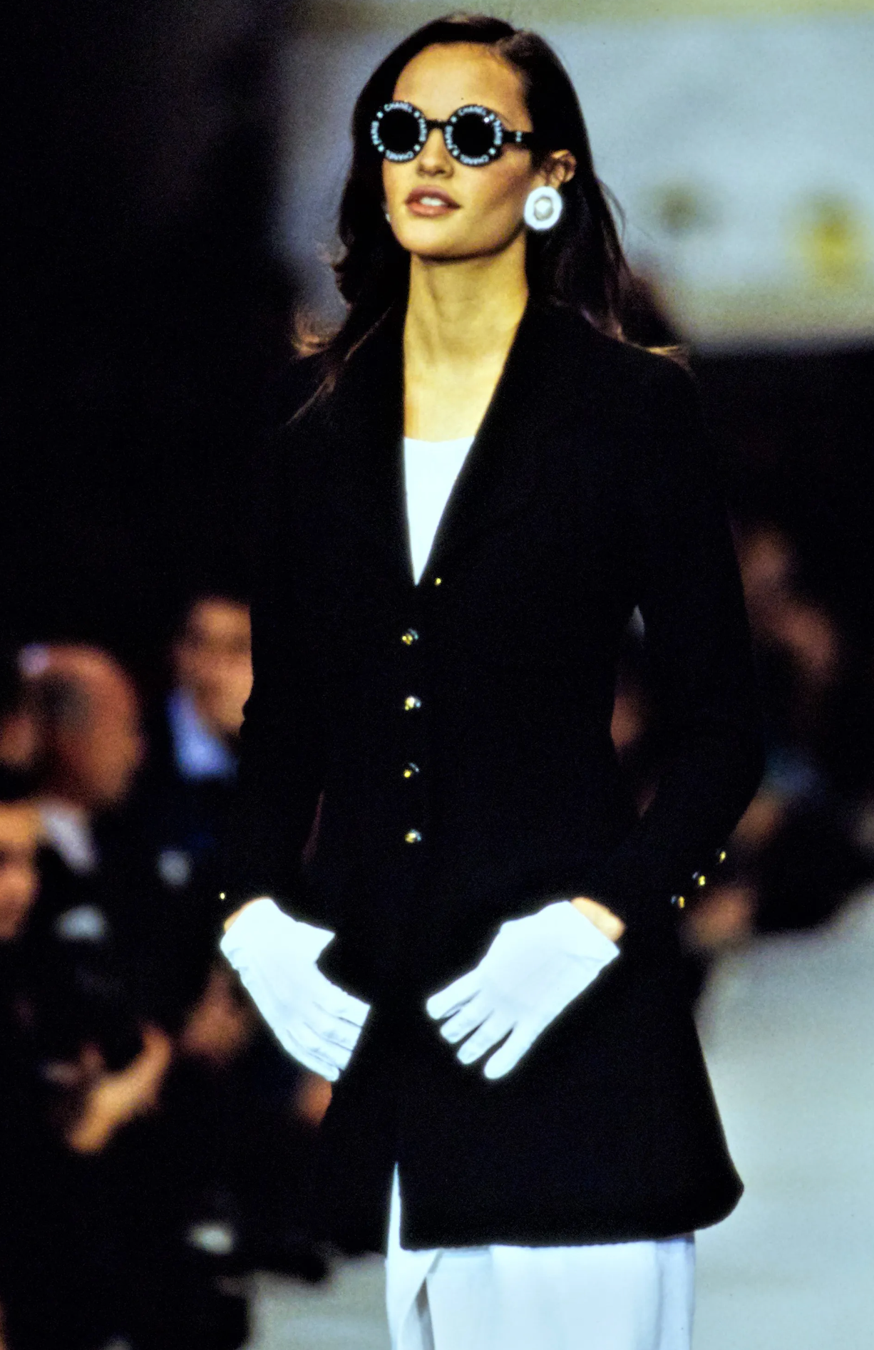 Round logo sunglasses by Chanel on model on 1993 runway