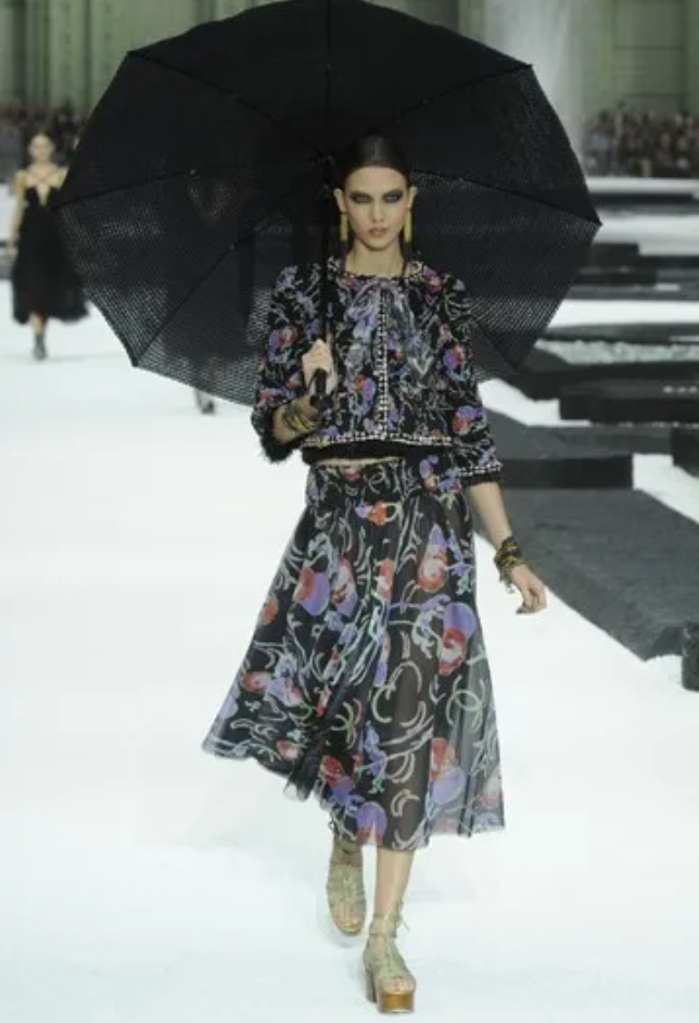 Chanel Floral Mesh Handkerchief Skirt on model on 2011 runway @ Recess LA