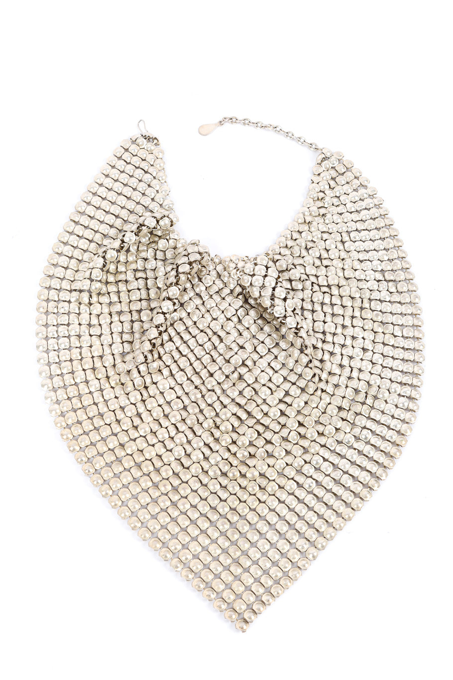 Silver tone metal mesh bib necklace flat lay in shape @recessla