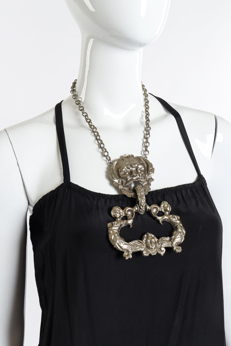 Vintage Boca de Veritas Door Knocker Necklace on mannequin @recessla