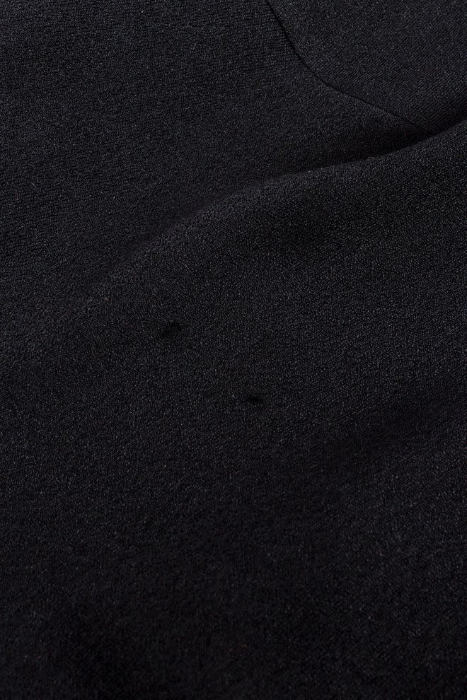 Sydney North Turtleneck Fringed Jumpsuit pulls closeup @RECESS LA