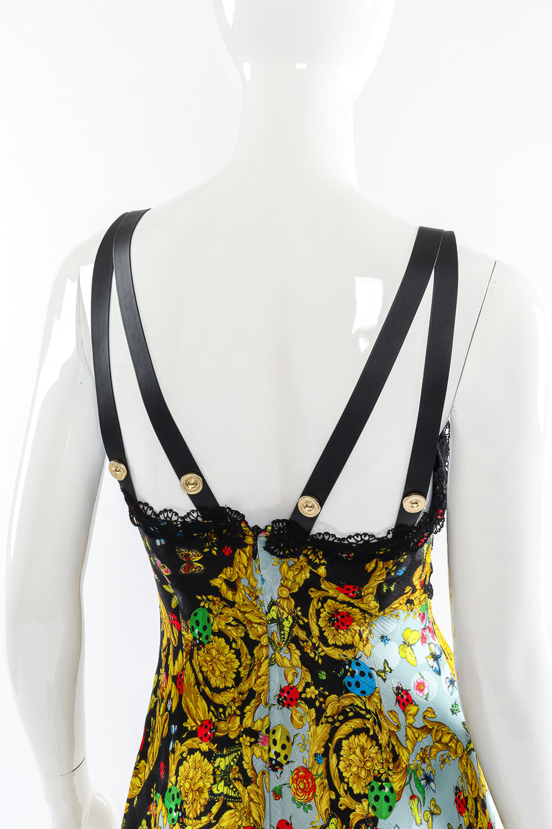 Printed mini dress by Versace Jeans Couture on mannequin back straps close @recessla