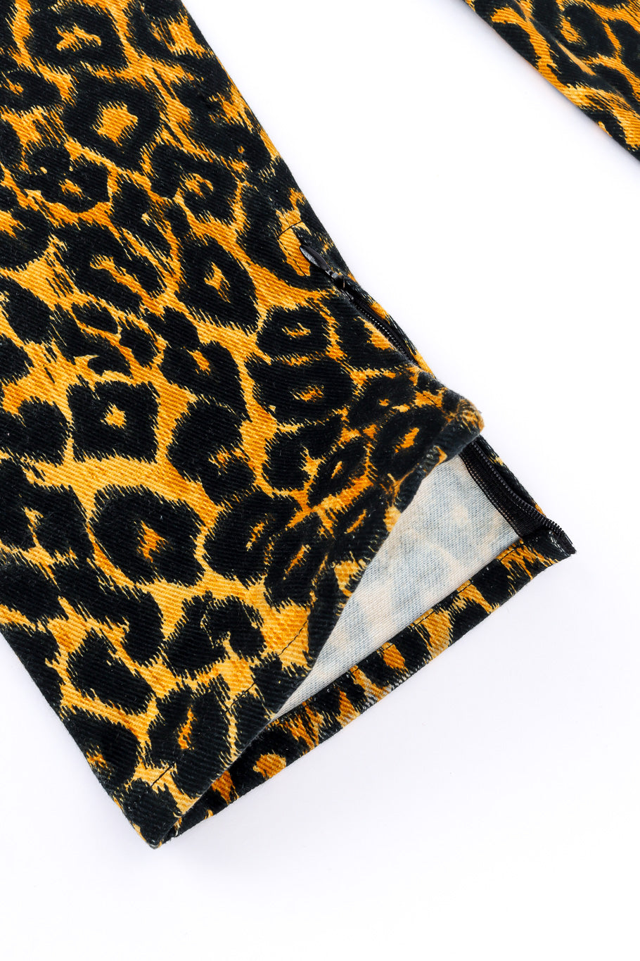 Versus Versace Leopard Print Denim Pant zip pull at hem closeup @Recessla