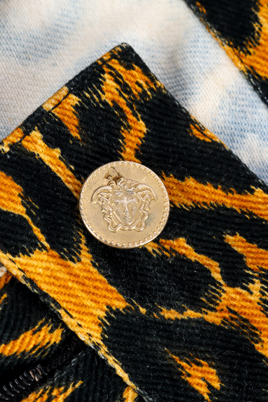 Versus Versace Leopard Print Denim Pant medallion button closeup @Recessla