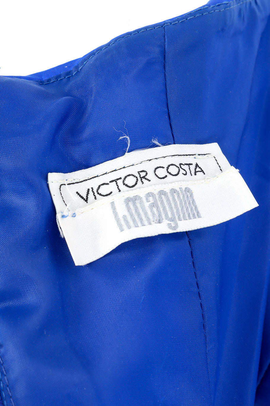 Strapless party dress by Victor Costa flat lay label @recessla