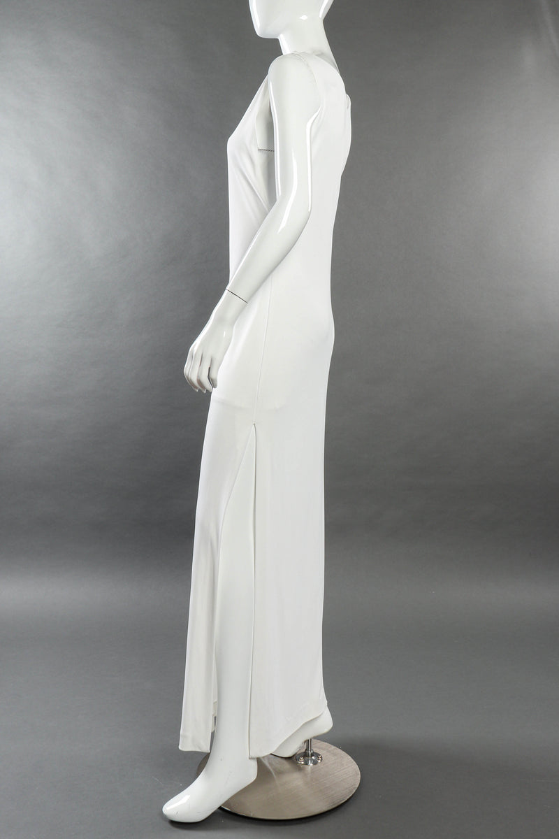 versace sculptural shoulder cut-out dress That electric lime-green mini dress is one of the standout looks from Gianni Versace's Spring/Summer 1996 collection a season that perfectly captured the sleek, minimalist side of Versace while still delivering