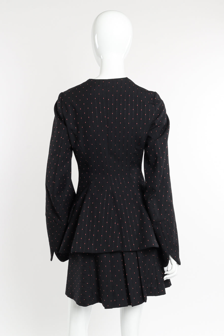 Peplum Flare Jacket & Skirt Suit by Vivienne Westwood on mannequin back @recessla