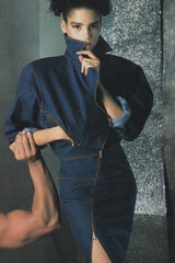 Vintage Asymmetrical Zip Denim Skirt on model with man arm in 1986