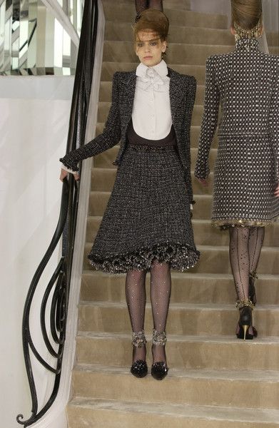 2002 F/W Bouclé Tweed skirt by Chanel on model on 2002 runway with petticoat 
