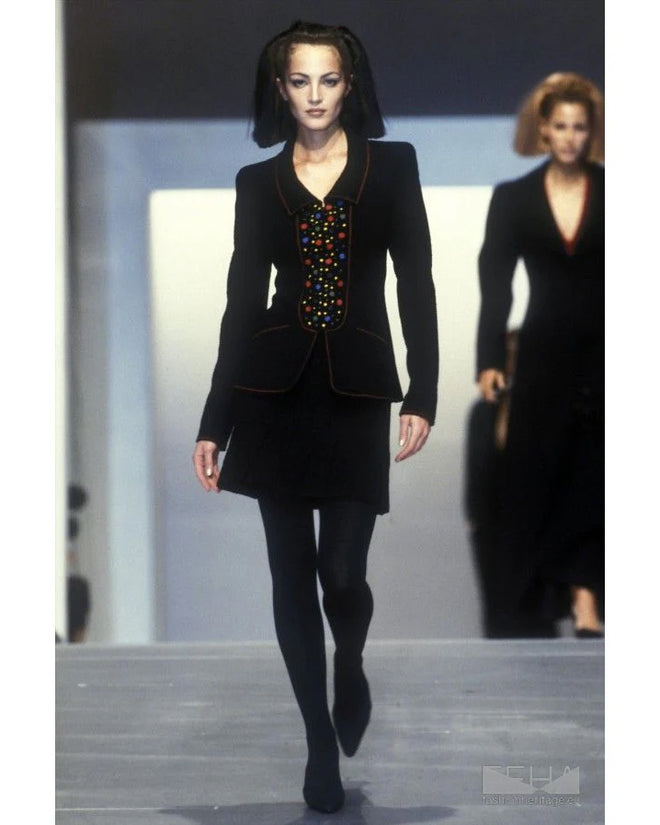 skirt and jacket set by Chanel on model on runway @ Recess LA