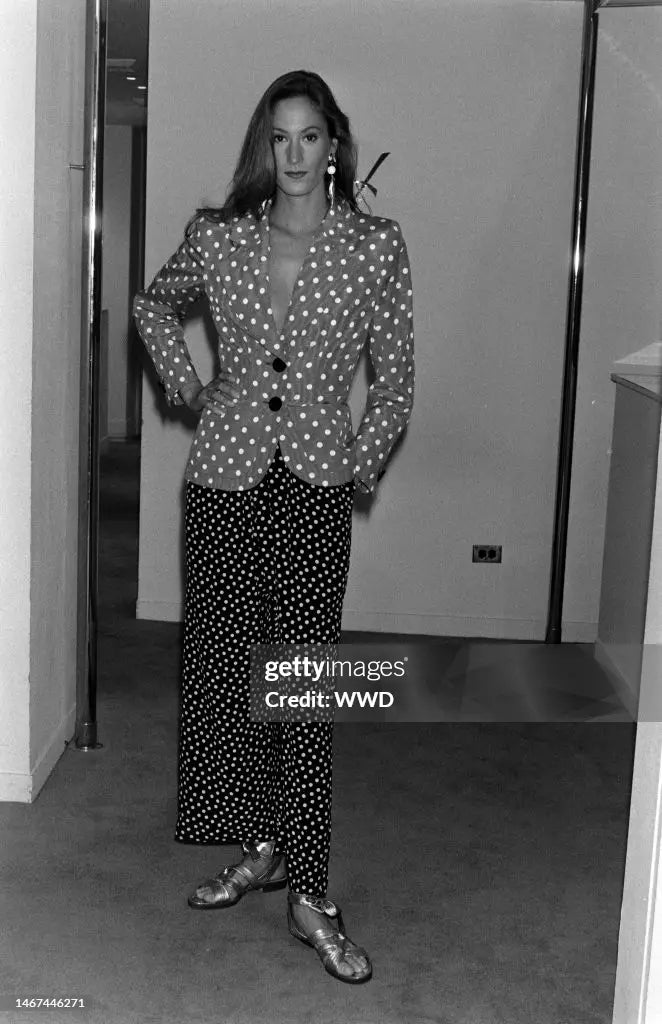 dot blazer by Yves Saint Laurent on model on runway via Getty