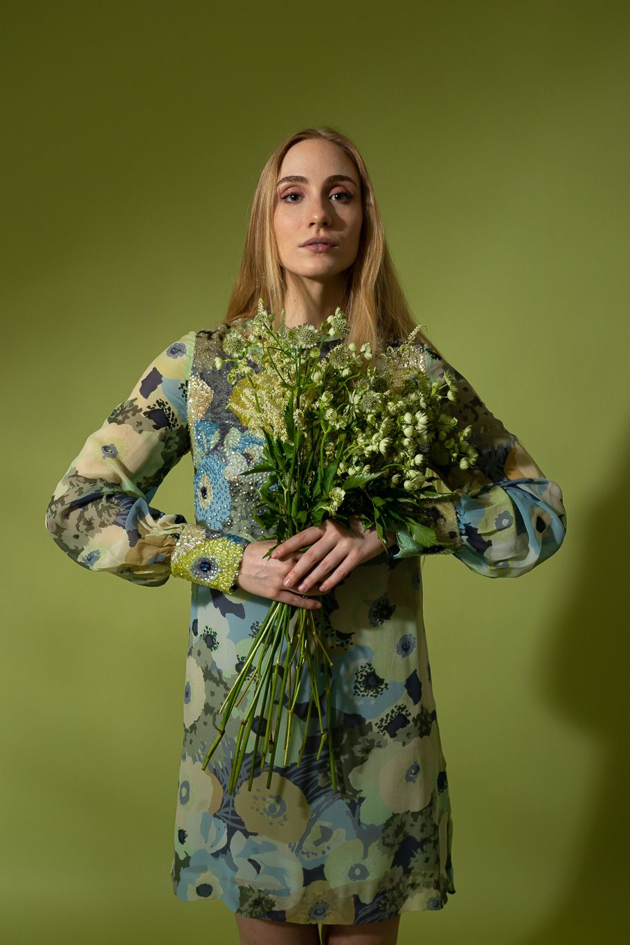 Vintage Ken Scott dress on model on green background with bouquet of flowers @recessla