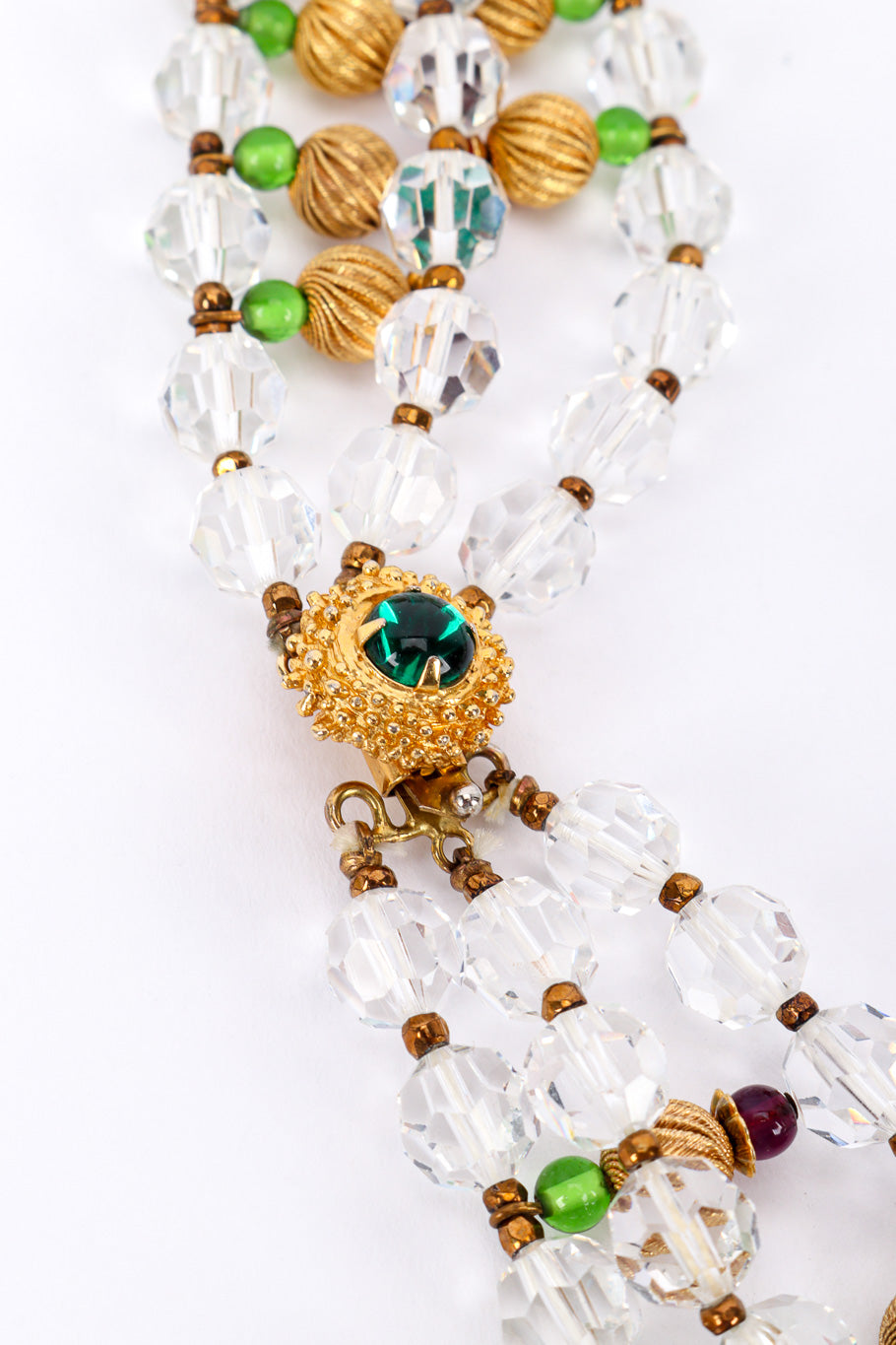 Vintage 3-Strand Beaded Necklace beaded clasp closeup on a white backdrop @Recessla