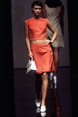 Salvatore Ferragamo Tan Top Handle Wicker Basket Bag in white on model on 1996 runway 