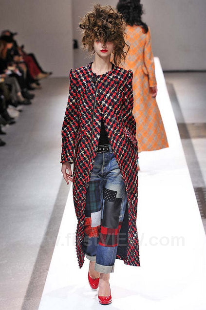 plaid coat by Juna Watanabe x Comme Des Garçons on mannequin on 2013 runway