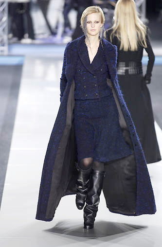 long bouclé vest by Chanel on model on 2002 runway