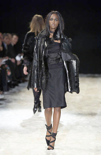 tie pumps by Gucci on model on 2002 runway 