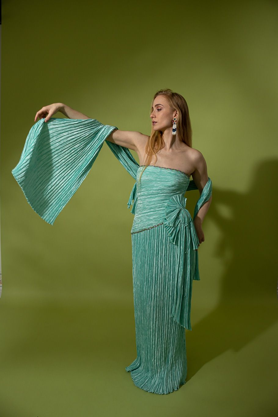 Gown on model in front of green background @recessla