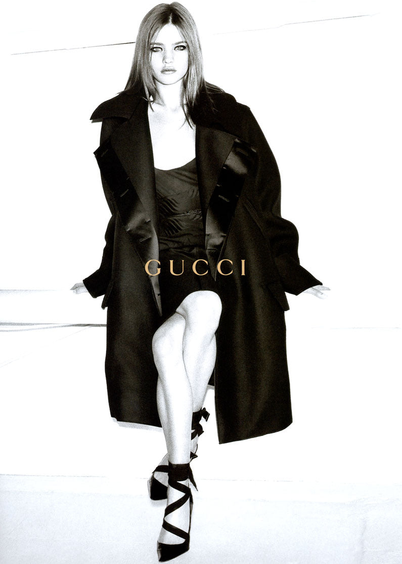tie pumps by Gucci on model in 2002 ads