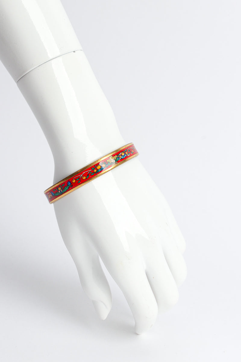 Vintage Hermés Peacock Fern Narrow Enamel Bracelet on mannequin wrist @ Recess LA