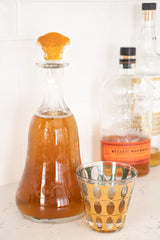 Vintage Versace Rosenthal Amber Medusa Crystal Bottle Stopper drink at Recess Home Los Angeles