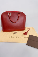 Louis Vuitton Epi Alma NM Handbag in Rubis Red