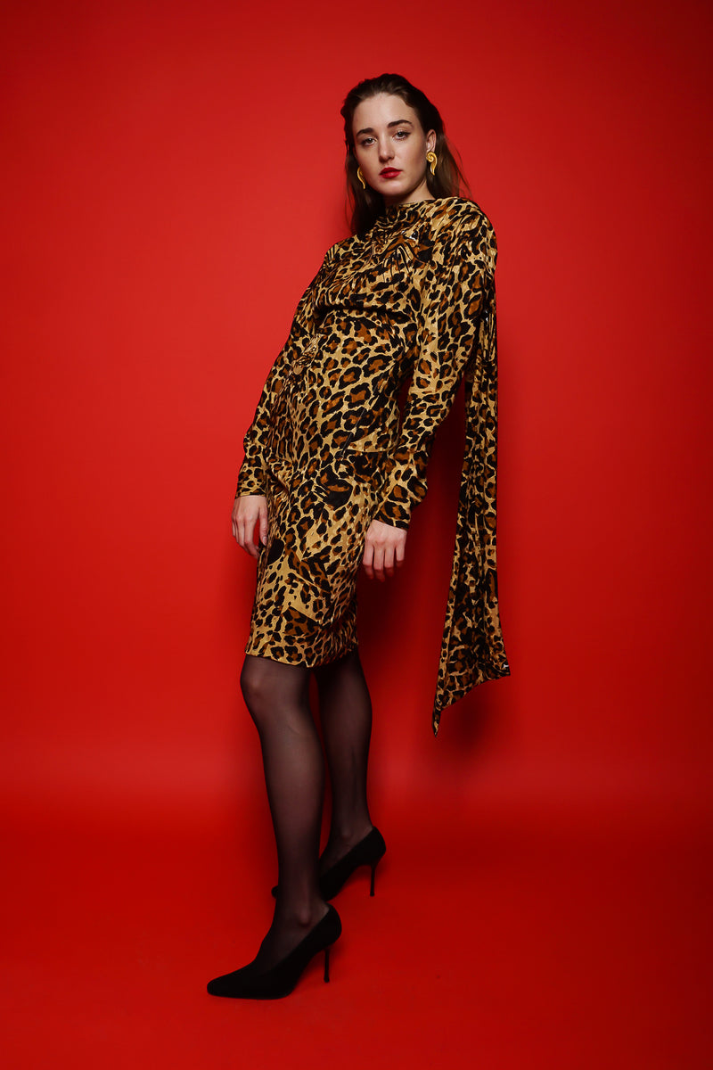 Girl in Vintage Yves Saint Laurent YSL Leopard Scarf Dress on red backdrop @ Recess Los Angeles