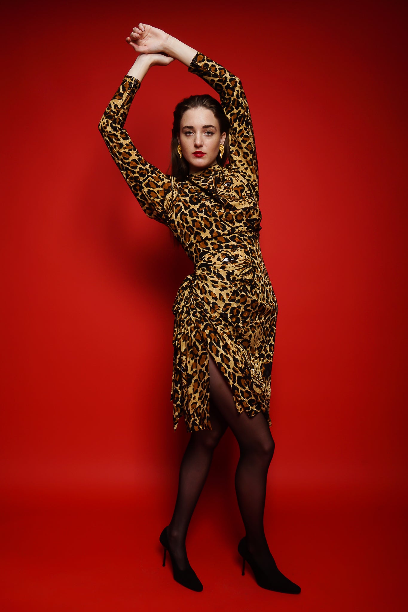 Girl in Vintage Yves Saint Laurent YSL Leopard Scarf Dress on red backdrop @ Recess Los Angeles