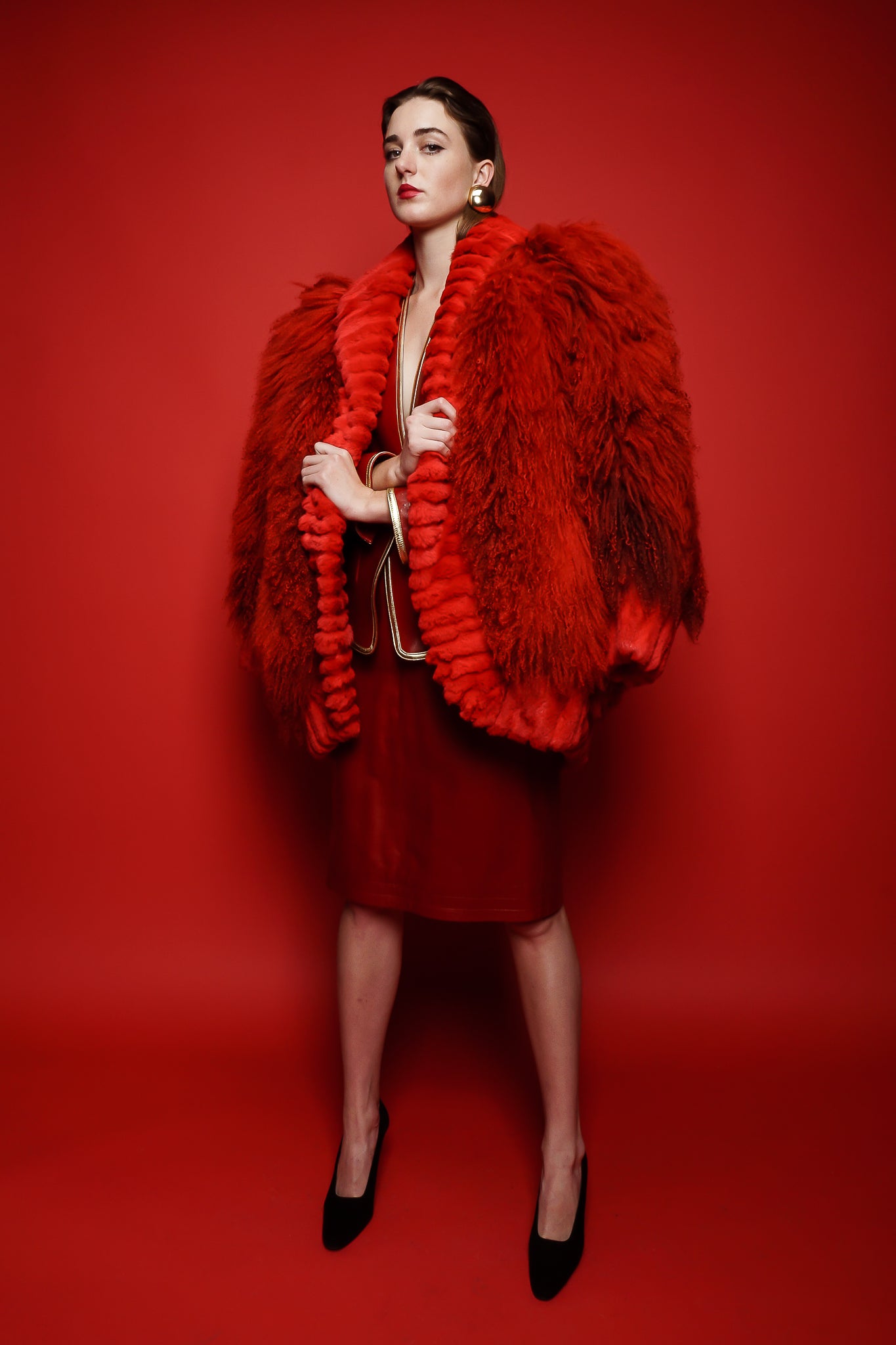 girl in Vintage Evans Red Mongolian Fur Shawl Collar Coat & YSL red leather suit on red @ Recess LA