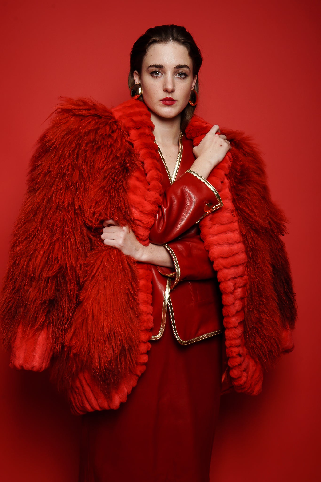 girl in Vintage Evans Red Mongolian Fur Shawl Collar Coat & YSL red leather suit on red @ Recess LA