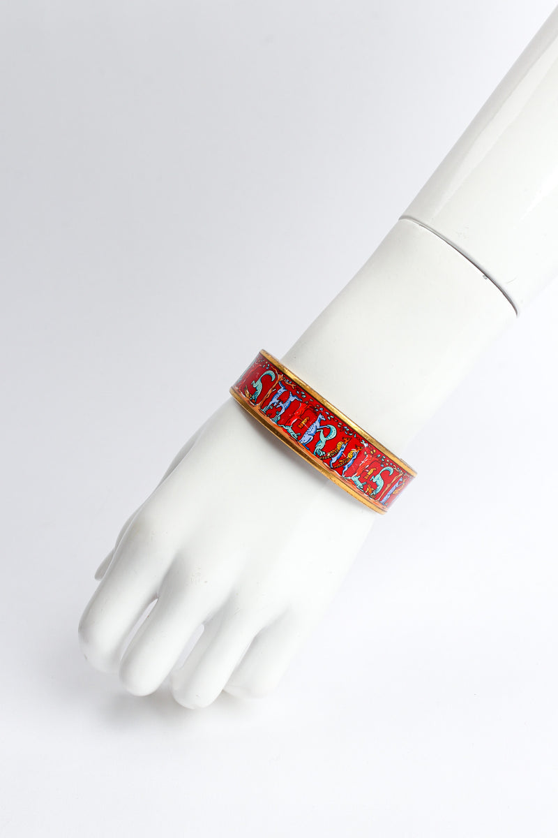 Vintage Hermés Animal Alphabet Wide Enamel Bracelet on mannequin wrist @ Recess LA