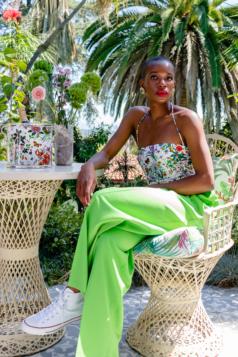 Monica Ahanonu in Vintage Gucci Flora Print Maillot Swimsuit and lime Escada pant at Recess Los Angeles