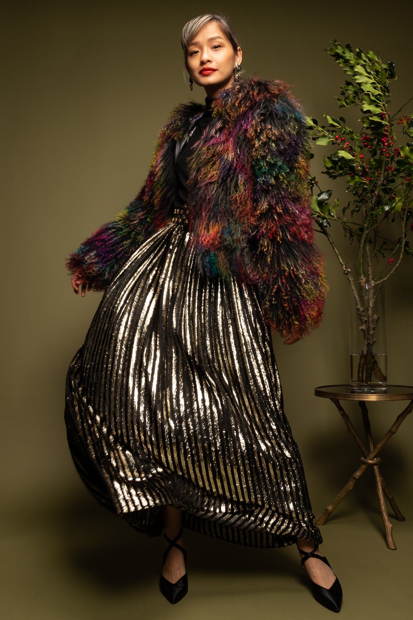 girl in Vintage Adolfo Velvet Lamé Stripe Skirt & Armani rainbow Mongolian fur on olive @ Recess LA