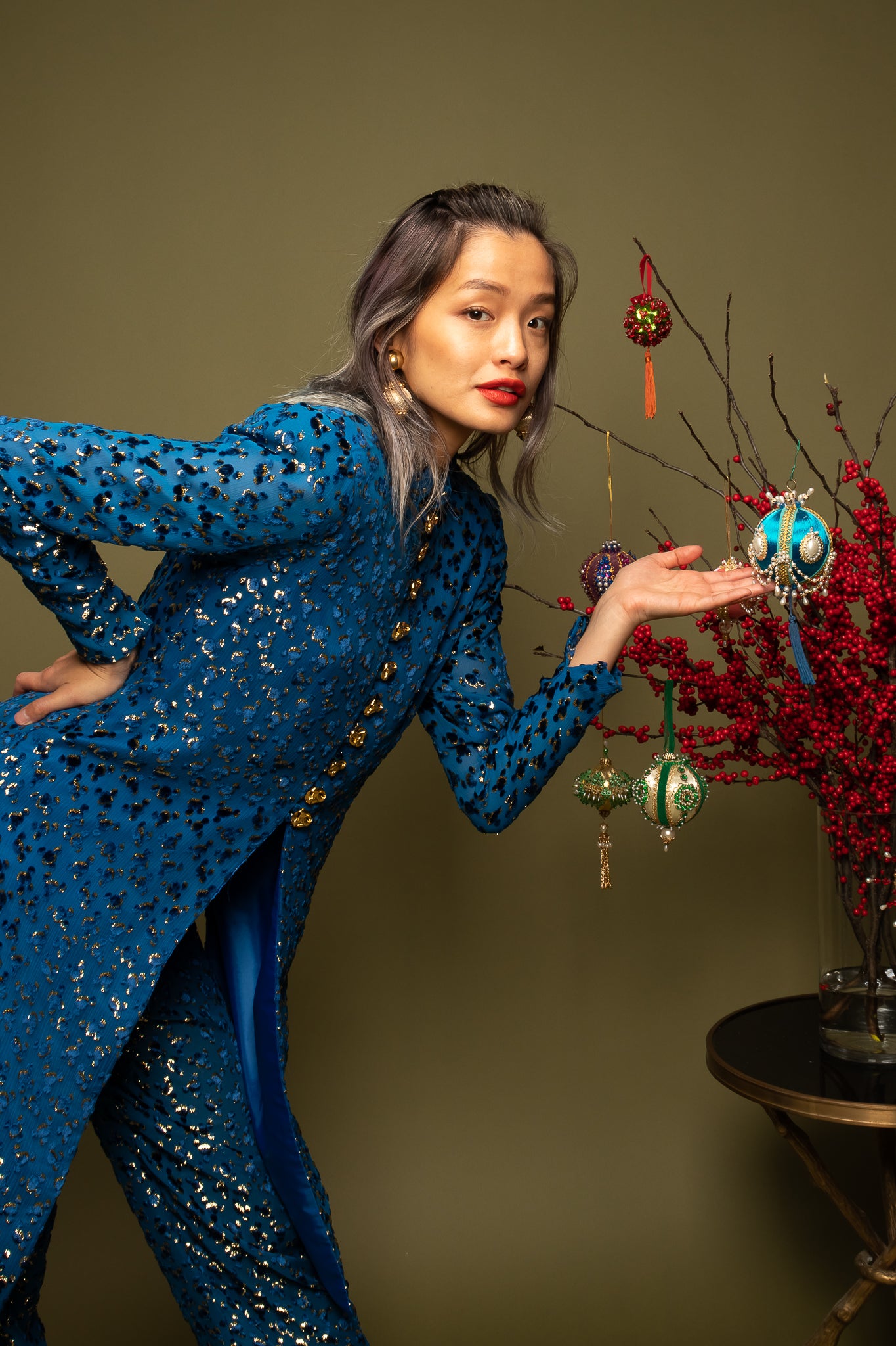 girl in Vintage Richilene Silk Velvet Lamé Leisure Suit with ornaments on olive at Recess Los Angeles