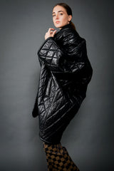 Girl in Vintage Anne Klein Quilted Leather Cocoon Coat w/ black top & Fendi pant at Recess LA