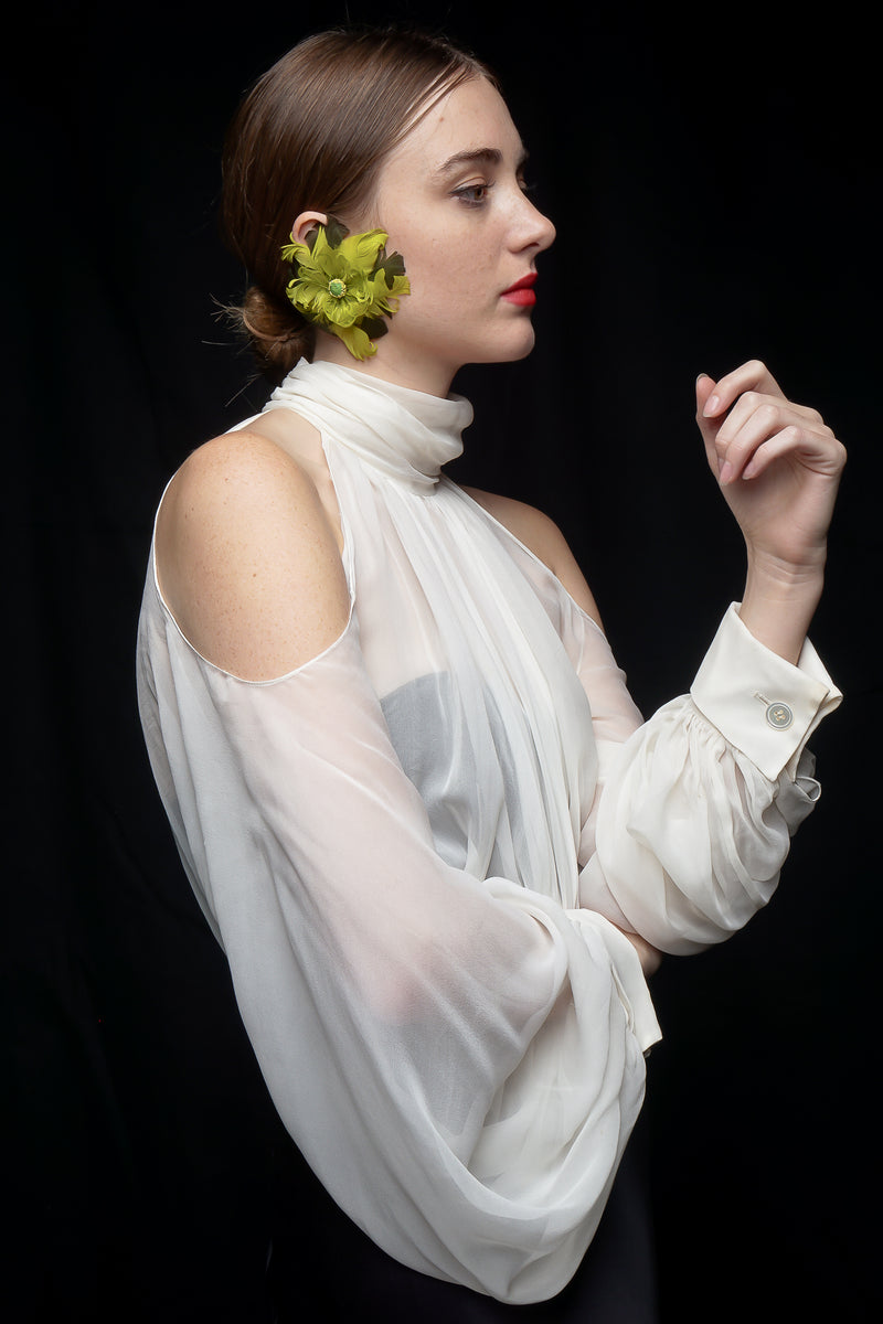 girl wearing Vintage Chartreuse Feather Flower Earrings and white blouse at Recess Los Angeles