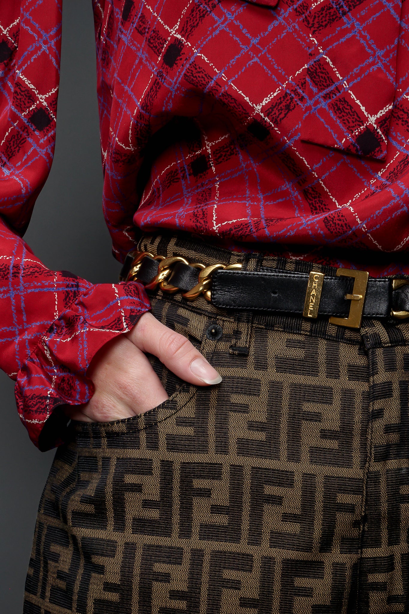 Vintage Chanel Iconic Woven Leather Chain Belt on Fendi pants at Recess Los Angeles