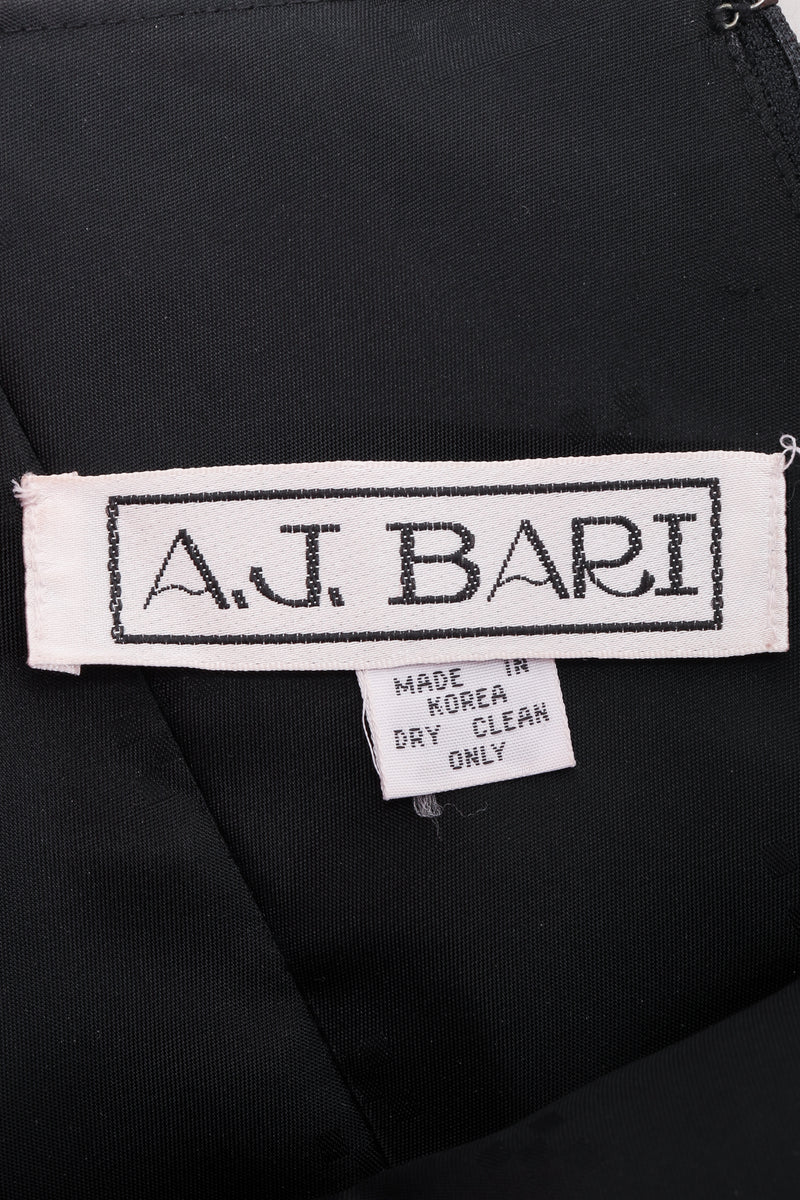 Vintage AJ Bari Tropical Puff Shoulder Dress label on black