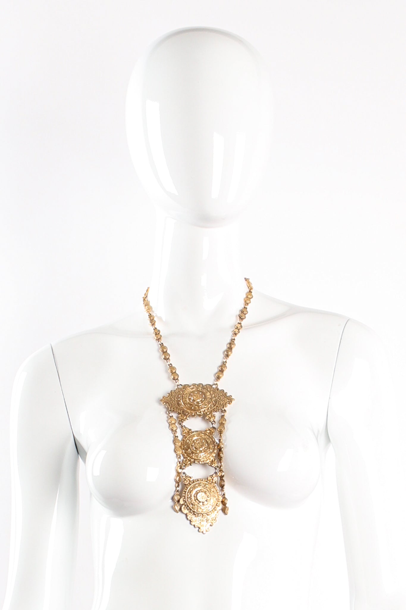 Vintage Accessocraft Triple Medallion Plate Pendant Necklace on mannequin at Recess Los Angeles