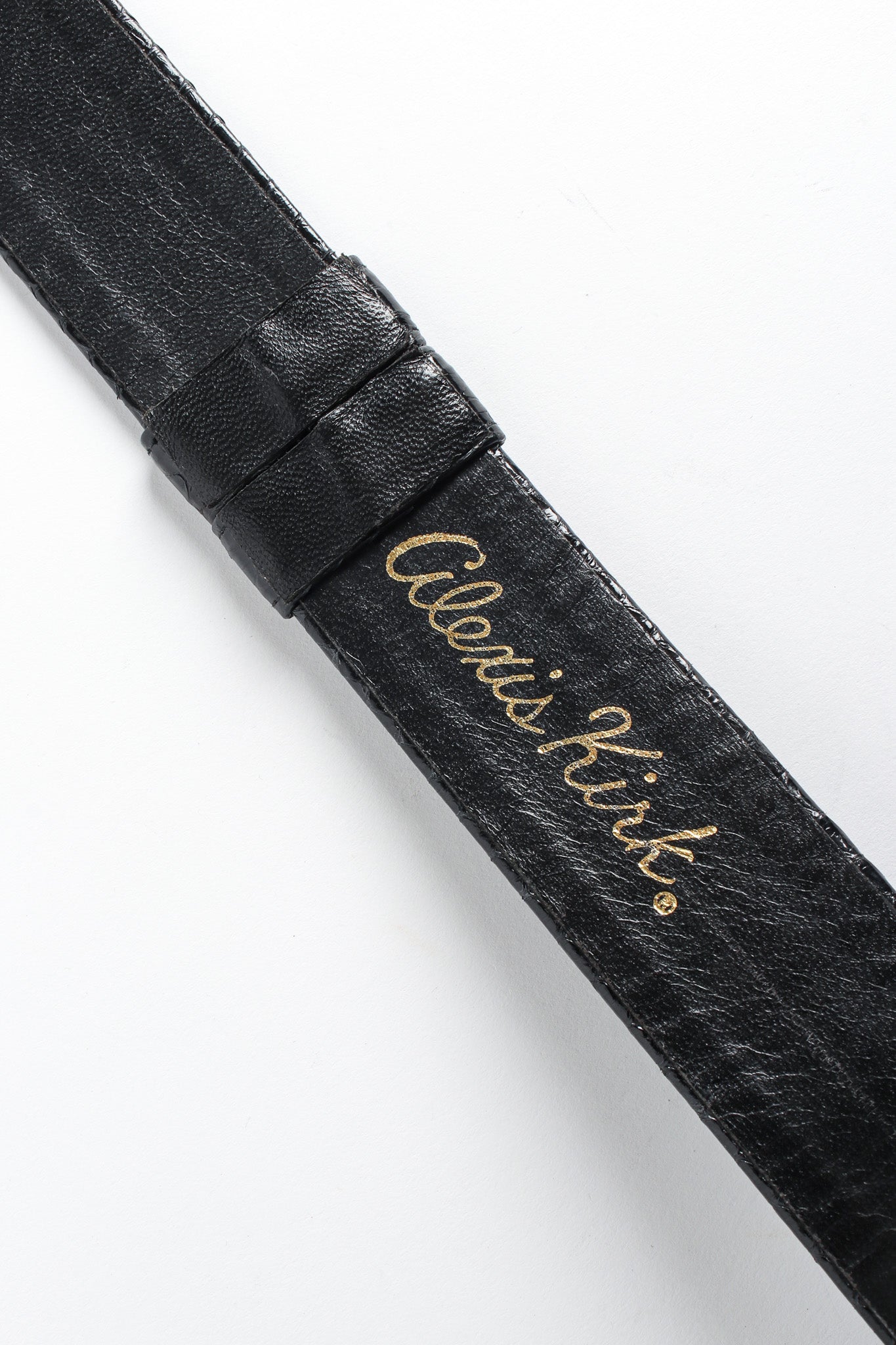 slide belt with textured buckle by Alexis Kirk signtaure @recessla