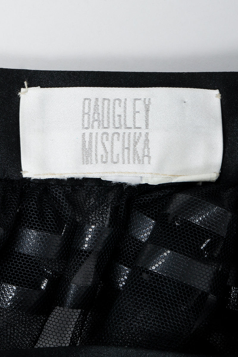 Vintage Badgley Mischka label on black fabric