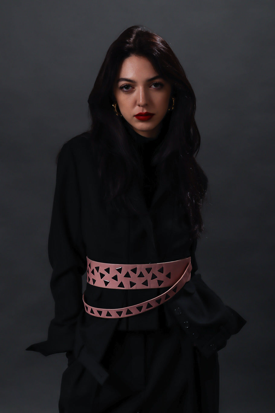 Geometric triangle studded statement belt with detachable strap by Lasso on model @recessla