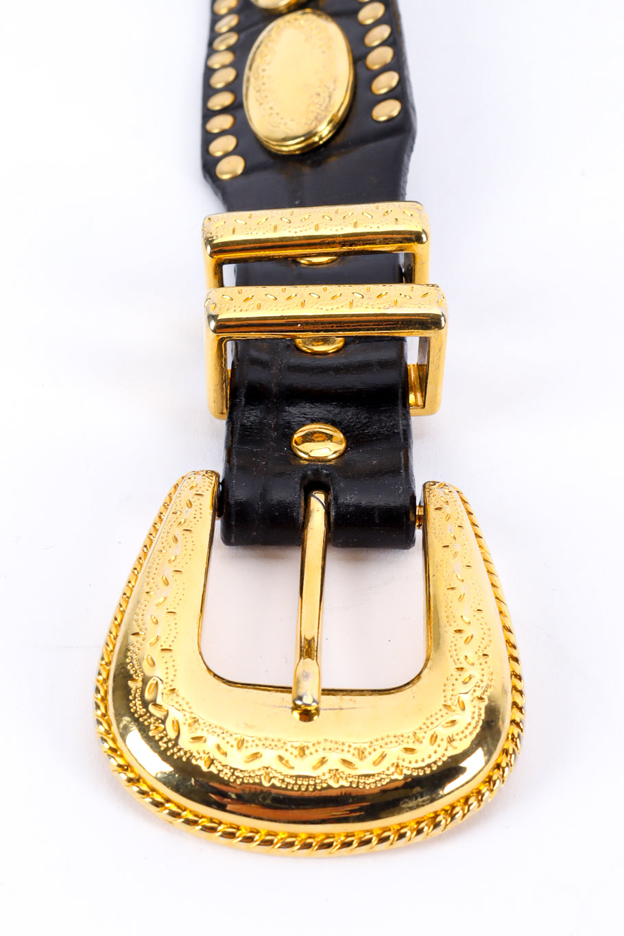 Vintage gold metal tone oval filigree-studded leather belt flat lay buckle details. @recessla